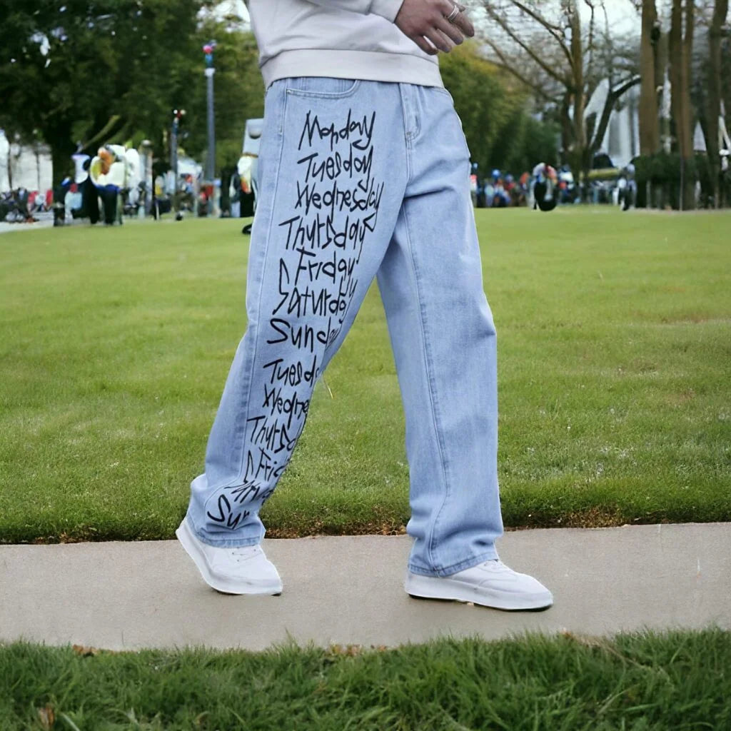 Men’s Light Blue Week Print Baggy Jeans – Oversized Streetwear Denim with Monday to Sunday Graphic Design